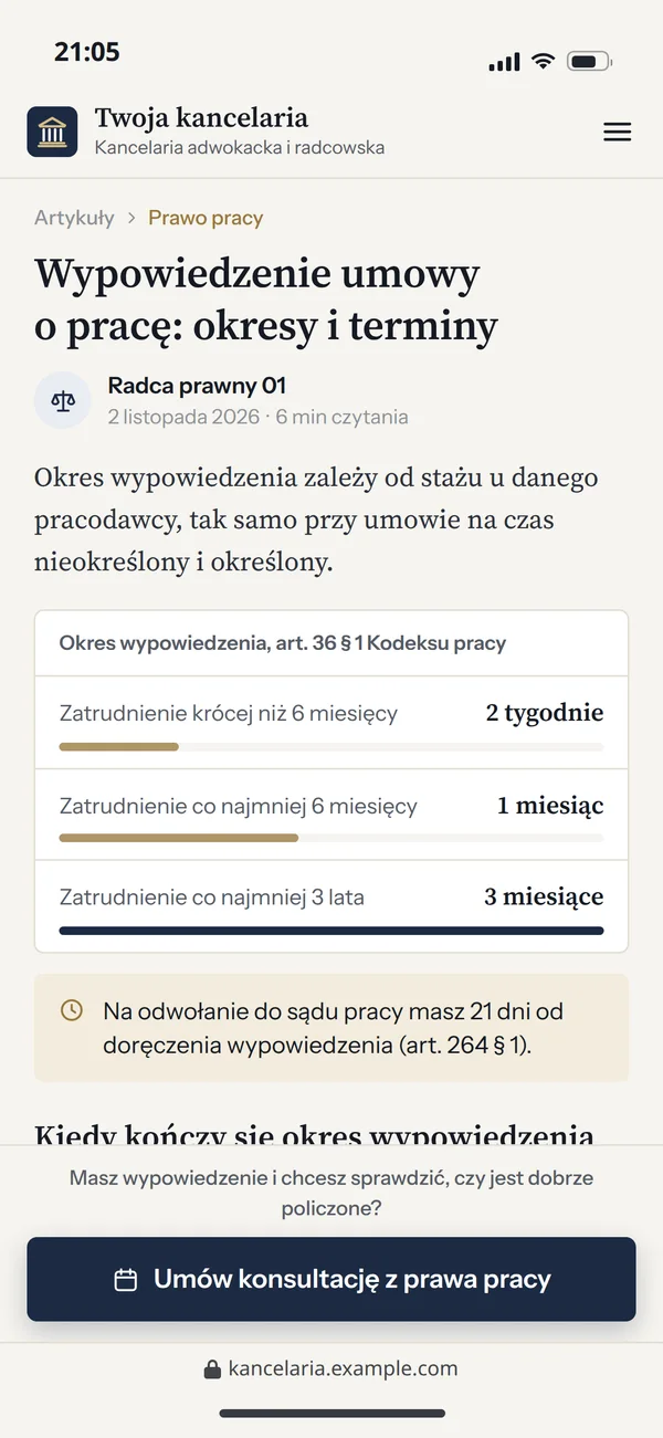Artykuł z prawa pracy na telefonie z przyciskiem umówienia konsultacji